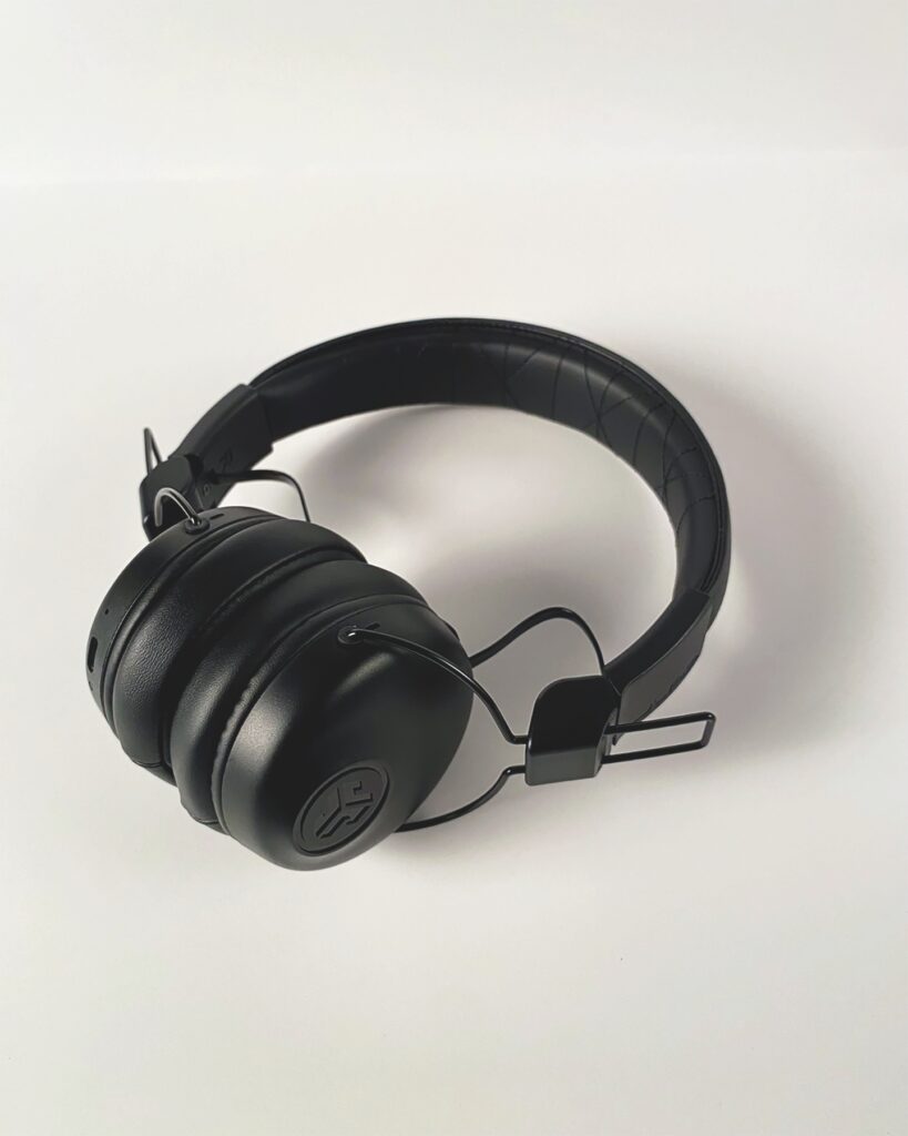 A product shot of a black headset